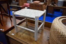 A painted footstool