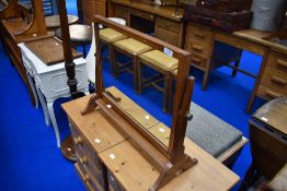 An Arts and Crafts golden oak toilet mirror, believed to be Arthur Simpson Handicrafts , unlabelled