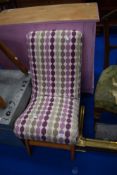 A vintage style upholstered nursing chair