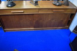 A vintage teak Long John style sideboard having two frieze drawers and sliding doors, width