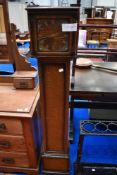 A vintage oak cased grandmother style long case clock having westminster chime, height approx.