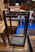 An early 20th Century oak stick stand