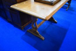 A vintage chunky pine refectory style dining table