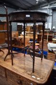 An early 20th Century mahogany occasional table in the Adams style