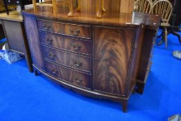 A reproduction Regency bow front sideboard having four central drawers flanked by cupboards, width
