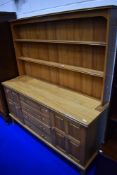 A vintage lightwood dresser, possibly early Ercol