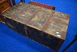 A vintage wooden travel trunk