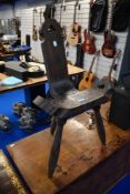 A traditional carved birthing stool