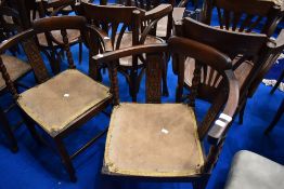 A pair of early 20th Century oak corner chairs