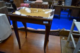 An Italian style inlaid sewing table