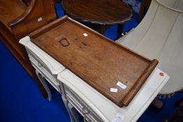 An Arts and Crafts golden oak tray, believed to be Arthur Simpson Handicrafts , unlabelled