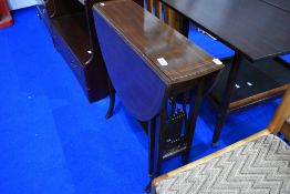 An Edwardian mahogany gateleg occasional table