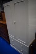 A Victorian painted wardobe having double drawer base (no top apron)