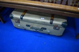 A vintage suitcase labelled and fitted for 'Resusi Anne' but no contents