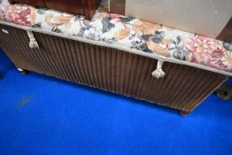 A Lloyd loom ottoman