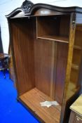 An early 20th Century mahogany and walnut double wardrobe