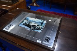 A Rolls Royce branded mirror, approx. 54 x 49cm
