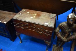 A vintage oak cantilever sewing box and contents including quantity of cotton reels