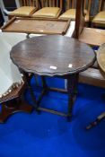 An early to mid 20th Century oak occasional table