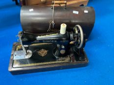 A cased Singer sewing machine