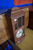 An early 20th Century oak cased wall clock, silvered dial stamped Haller A.G.