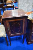 An Edwardian mahogany pot cupboard