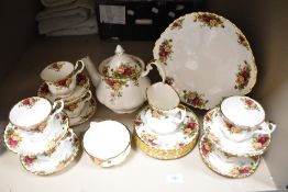 A Royal Albert Old Country Roses pattern part tea service for six with tea pot.
