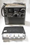 A vintage Ferguson clock radio and a Sony ICF-5900w radio set.