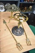 Two Victorian fire side brass trivets with two toasting forks.