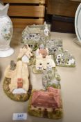 Ten vintage Lilliput lane model houses.