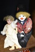 An early 20th century German porcelain headed doll with articulated wooden body, Rascal Hobo no.