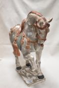 A modern large decorative animal study of a Chinese Tang style horse. 46cm tall