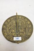 A 20th century sundial with a foliate styled Gnomon with chase style decoration of two phoenix.