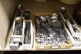 A large collection of modern stainless steel cutlery in the Kings Regal pattern. Appears unused.