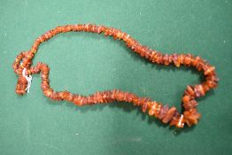 A vintage string of amber beads.