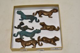 Seven Chinese big cat ornaments in cast metals.