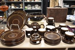 A vintage Denby brown glazed part tea and dinner service.