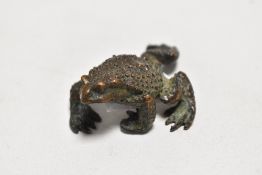 An early 20th century Japanese Okimono animal study of a Toad in bronze. Aprox 4cm long