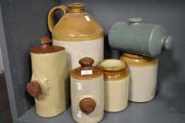 A selection of stone ware utility ceramics including green glazed hot water bottle, large jug 41cm