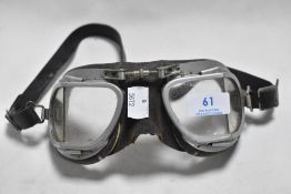 A pair of early 20th century Stadium motorcycle or aviation goggles.