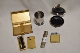 A collection of cigarette lighters including Kingsway and Colibri with a cigarette case and hip