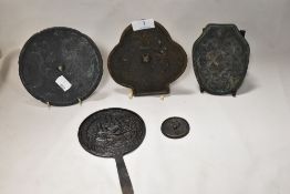 Two 18th century Japanese Kagami mirrors, one decorated with good luck coins and the other with a