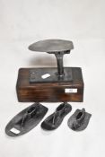A late Victorian childrens sized cobblers work platform with four detachable iron lasts.
