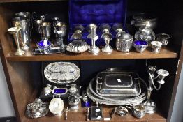 A selection of silver plated wares including a cased set of goblets, trinket dishes, table salt