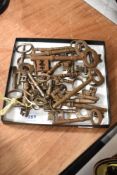 A selection of antique cast iron door and furniture keys.