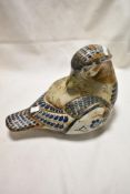 A modern Mexican Tonala animal study of a duck, in ceramic and being hand decorated. 35cm long.