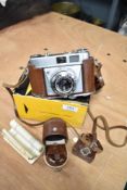 A vintage Kodak Retinette photography camera with original box.