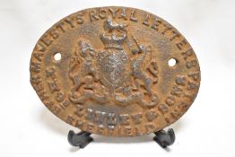 A Victorian cast iron insurance or similar plaque reading. By her majesty's Royal Letters Patent