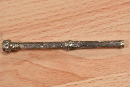 A late Victorian Propelling Pencil having a rolled gold case with chase worked design and purple