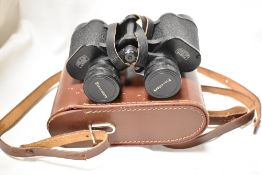 A pair of Carl Zeiss Jena 8x30W binoculars with fitted leather case.